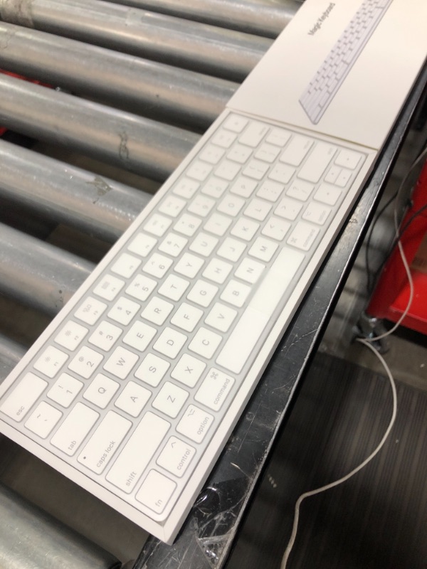 Photo 2 of Apple Magic Keyboard - US English, Includes USB-C to Lighting Cable, Silver