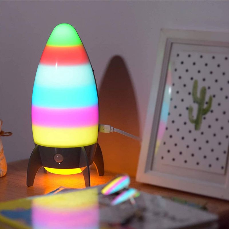 Photo 1 of Rocket Night Lights for Kids with 7 RGB Color-Changing Motion Sensor, Warm White Spaceship Bedside Lamp for Baby Room, Bedroom, Hallway