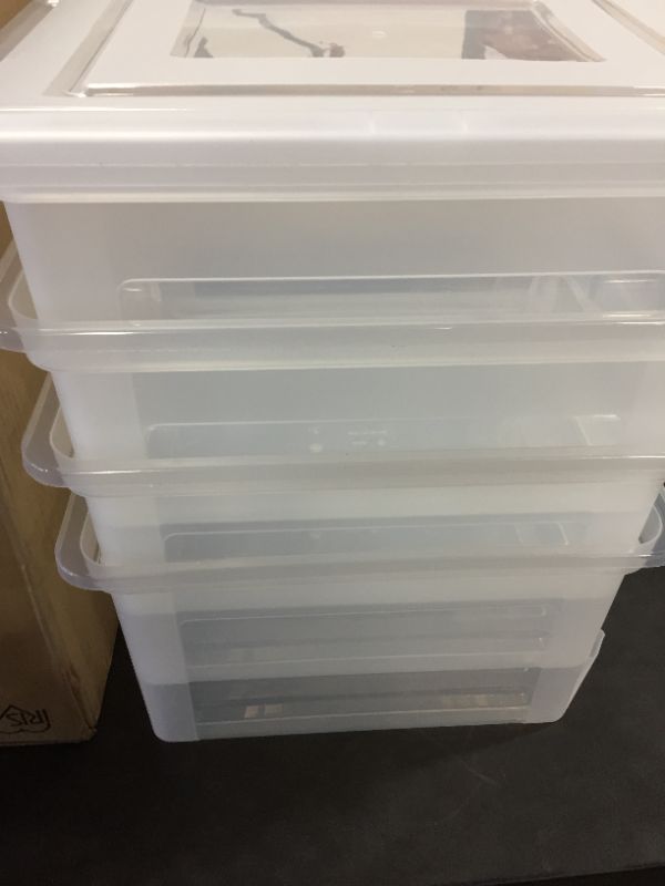 Photo 1 of 4 plastic storage tubs w/ lids