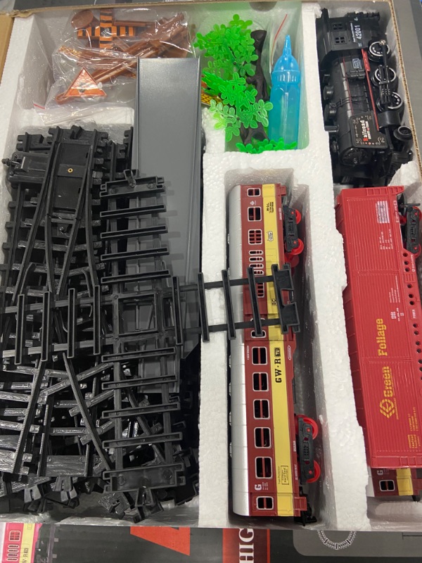Photo 5 of Electric Classical Train Sets with Steam Locomotive Engine, Cargo Car and Tracks, Battery Operated Play Set Toy w/ Smoke, Light and Sounds, Perfect for Boys...
