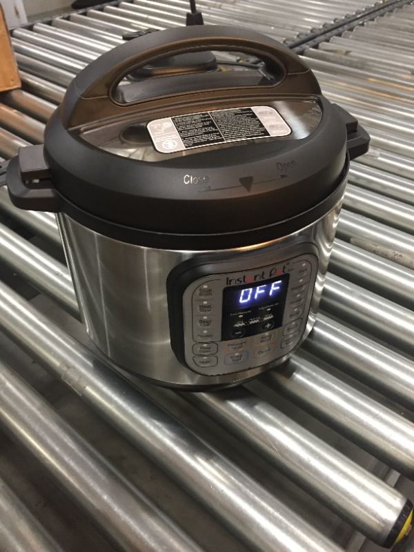 Photo 2 of Instant Pot Duo 7-in-1 Electric Pressure Cooker, Slow Cooker, Rice Cooker, Steamer, Sauté, Yogurt Maker, Warmer & Sterilizer, 6 Quart, Stainless Steel/Black