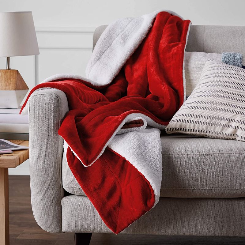 Photo 1 of Amazon Basics Ultra-Soft Micromink Sherpa Blanket - Throw, Red 14.6"L x 11.4"W