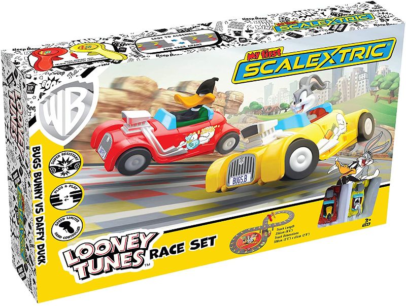 Photo 1 of Micro Scalextric My First Looney Tunes Bugs Bunny vs Daffy Duck Battery Powered 1:64 Slot Car Race Track Set G1141T, Yellow & Red
