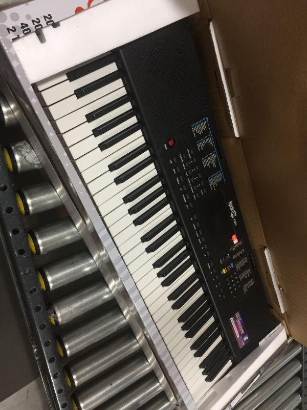 Photo 3 of RockJam 61 Portable Electronic Keyboard with Key Note Stickers, Power Supply and Simply Piano App Content, Compact (RJ361)
