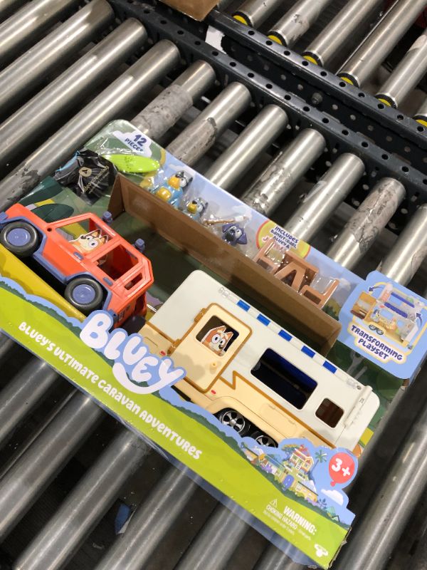 Photo 2 of Bluey Ultimate Caravan Adventures - Caravan Playset and Three 2.5-3" Figures & 4WD Family Vehicle with 2 Surfboards
