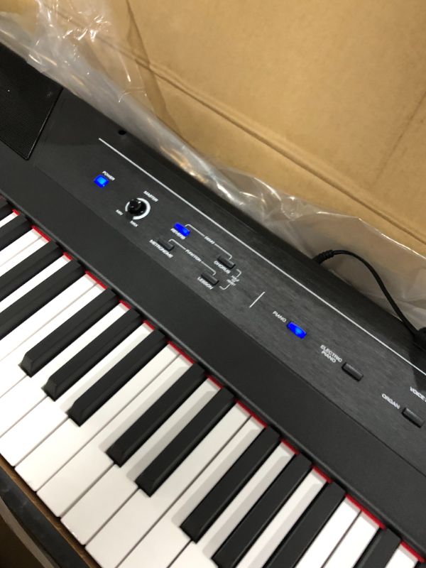 Photo 1 of Alesis Recital – 88 Key Digital Piano Keyboard with Semi Weighted Keys, 2x20W Speakers, 5 Voices, Split, Layer and Lesson Mode, FX and Piano Lessons
