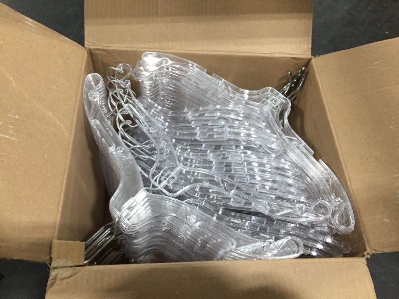 Photo 1 of 100 white clear hangers 