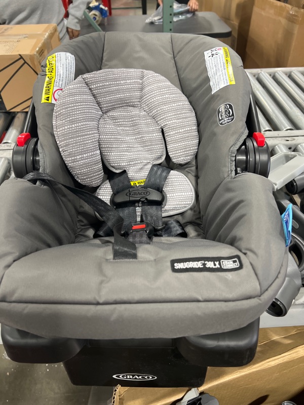 Photo 2 of Graco FastAction Fold SE Travel System with SnugRide Infant Car Seat - Carbie