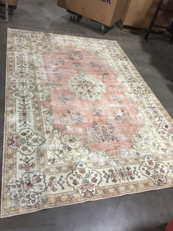 Photo 1 of 107" x  73" faded styled rug