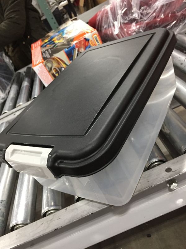 Photo 1 of 16"W x 11"L x 7"H plastic container 
