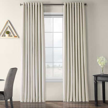 Photo 1 of Exclusive Fabrics & Furnishings Warm Off White Grommet Blackout Curtain one panel - 100 in. W X 120 in. L