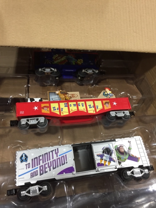 Photo 4 of Lionel Pixar's Toy Story Electric O Gauge Model Train Set w/Remote and Bluetooth Capability
