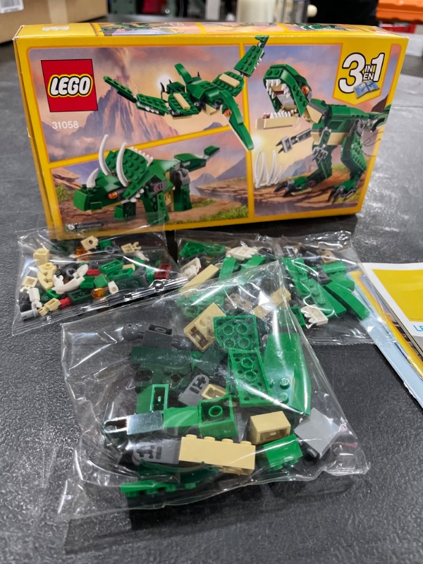 Photo 2 of LEGO Creator Mighty Dinosaurs 31058 Build It Yourself Dinosaur Set, Create a Pterodactyl, Triceratops and T Rex Toy (174 Pieces)
