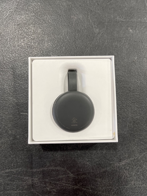 Photo 2 of Google Chromecast - Streaming Device with HDMI Cable - Stream Shows, Music, Photos, and Sports from Your Phone to Your TV
