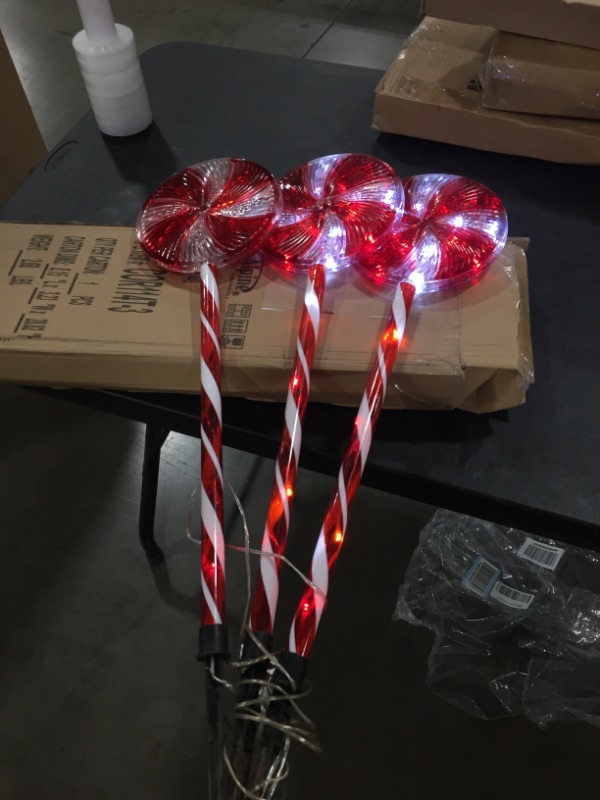 Photo 2 of Alpine Corporation COR114T-3 Candy Cane Pathway LED, Decorative Winter Christmas Lights for Front Yard, Red and White, Set of 3 Holiday décor
