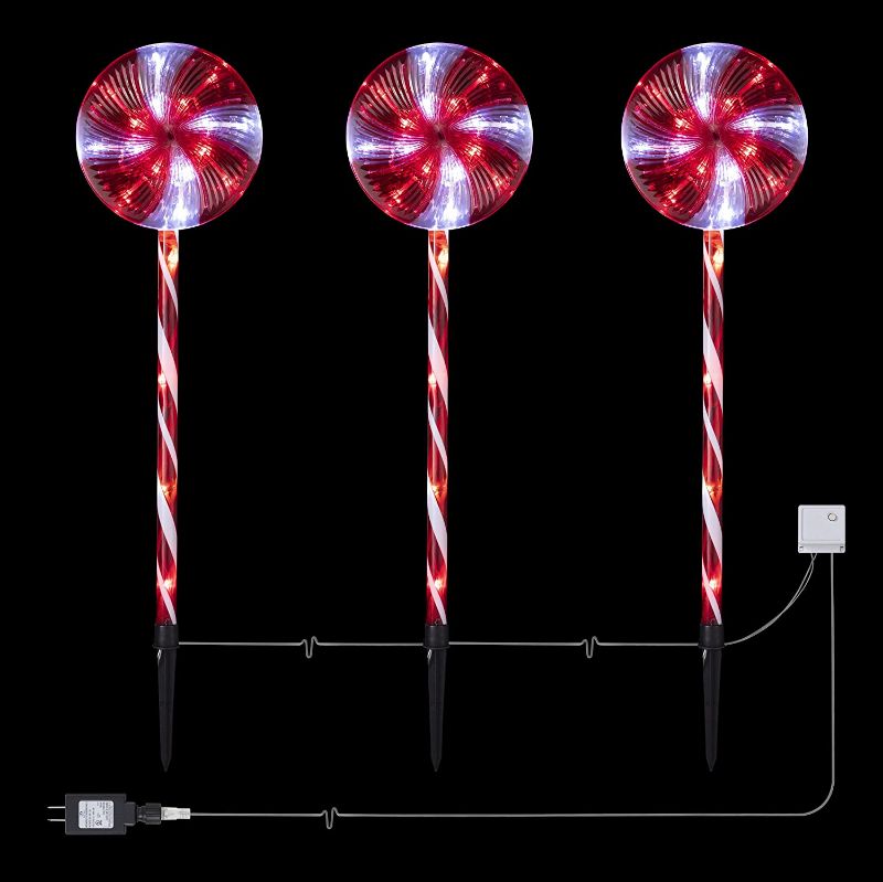 Photo 1 of Alpine Corporation COR114T-3 Candy Cane Pathway LED, Decorative Winter Christmas Lights for Front Yard, Red and White, Set of 3 Holiday décor
