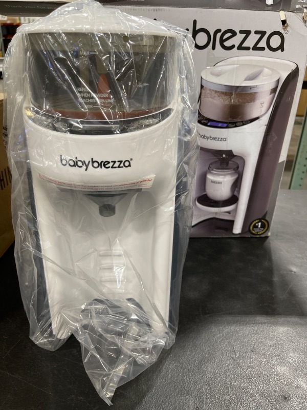 Photo 2 of New and Improved Baby Brezza Formula Pro Advanced Formula Dispenser Machine - Automatically Mix a Warm Formula Bottle Instantly - Easily Make Bottle with Automatic Powder Blending
