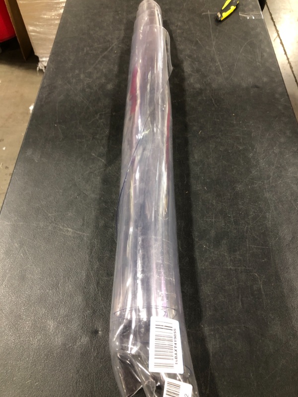 Photo 1 of CLEAR PLASTIC ROLLING OFFICE CHAIR PAD. PRIOR USE.