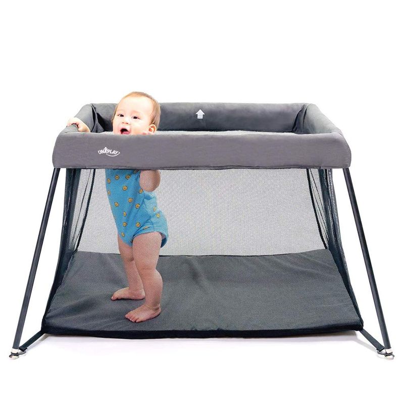 Photo 1 of UNiPLAY Foldable Travel Crib, Lightweight Portable Playpen, Easy to Pack Playard with Comfortable Mattress and Breathable Mesh Liner for Infants and Toddlers
