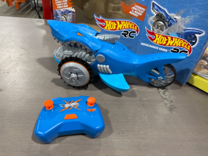 Photo 2 of Hot Wheels R/C Supercharged Shark Vehicle, Radio-Controlled Shark that Races on Land & Water, R/C Chomping Mechanism, Dynamic Steering
