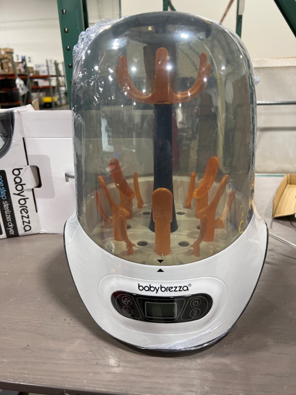 Photo 1 of Baby Brezza Baby Bottle Sterilizer and Dryer Machine – Electric Steam Sterilization - Universal Fit - Pacifiers, Glass, Plastic, and Newborn Feeding Bottles
