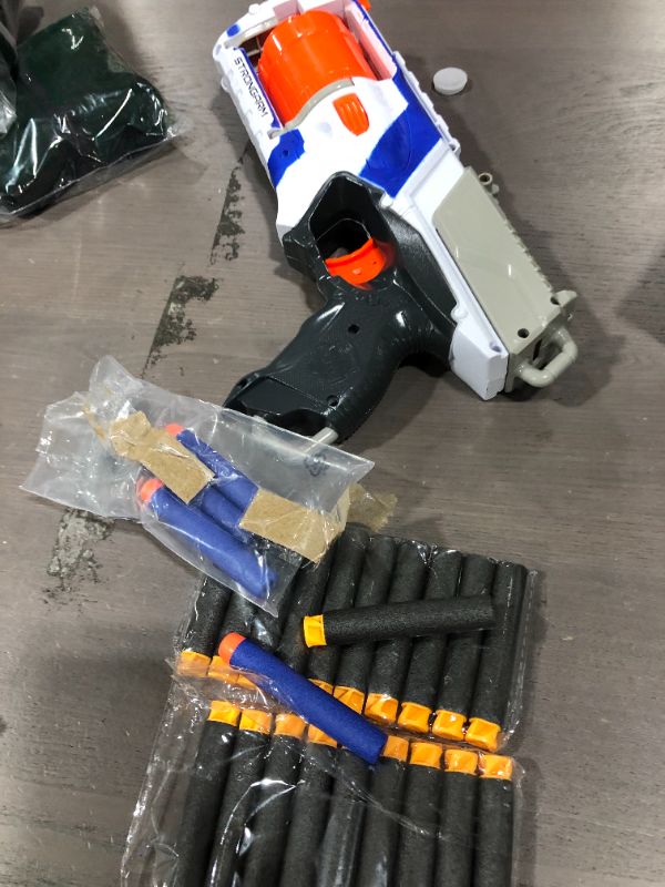 Photo 2 of Nerf N Strike Elite Strongarm Toy Blaster With Rotating Barrel, Slam Fire, And 6 Official Nerf Elite Darts For Kids, Teens, And Adults(Amazon Exclusive) w/ loose foam darts
