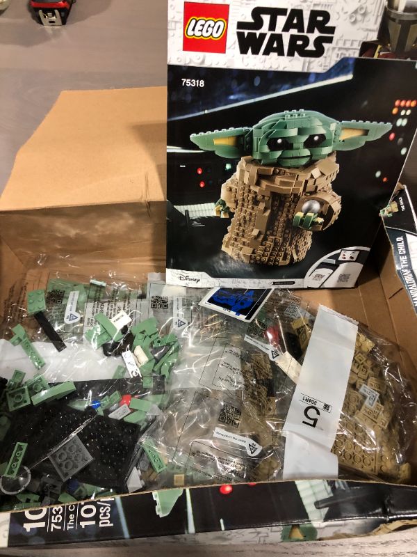 Photo 2 of LEGO Star Wars: The Mandalorian The Child 75318 Building Kit; Collectible Buildable Toy Model for Ages 10+, New 2020 (1,073 Pieces)
