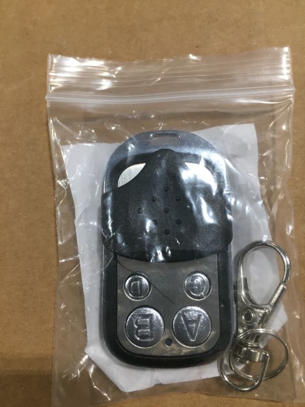 Photo 2 of Generic New ABCD 4 Channel Electric Universal Gate Garage Door Remote Key Control Transmitter Key Fob 434MHz Cloning Transmitt Key Fob