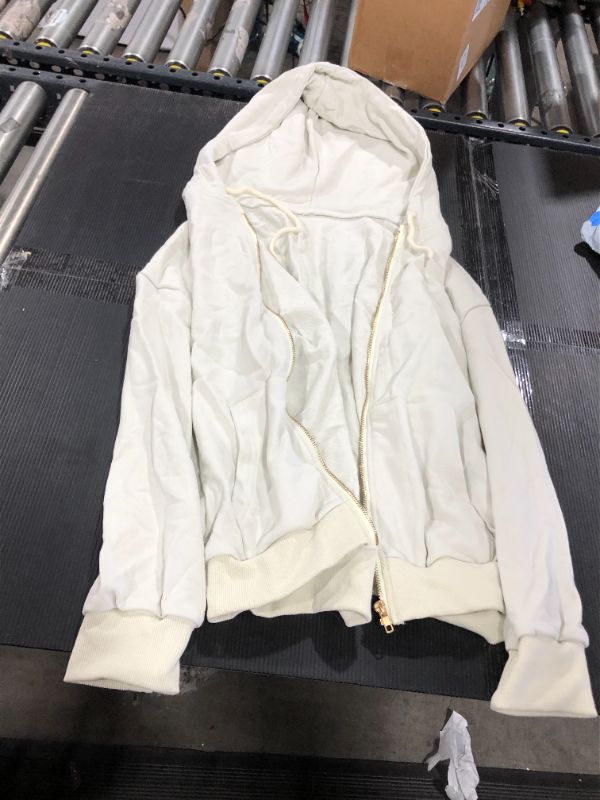 Photo 1 of light beige hooded jacket size M