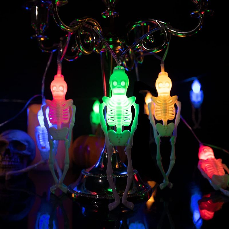 Photo 1 of WDF Halloween Skeleton Skull String Lights-2 strings/box 10feet 8 Modes Waterproof Battery Operated Holiday Lights-20Colorful Fairy Lights-Decorative Lights for Halloween Indoor Outdoor Decoration
