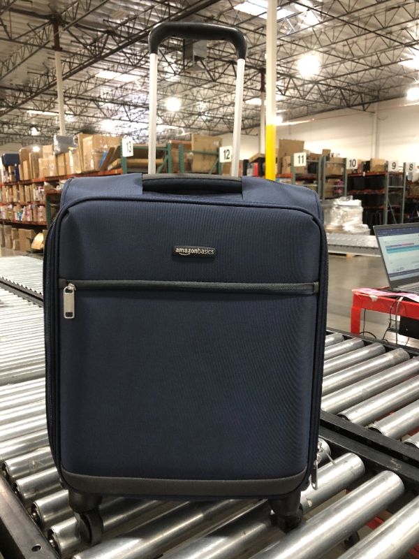 Photo 2 of Amazon Basics Softside Carry-On Spinner Luggage Suitcase - 21 Inch, Navy Blue
