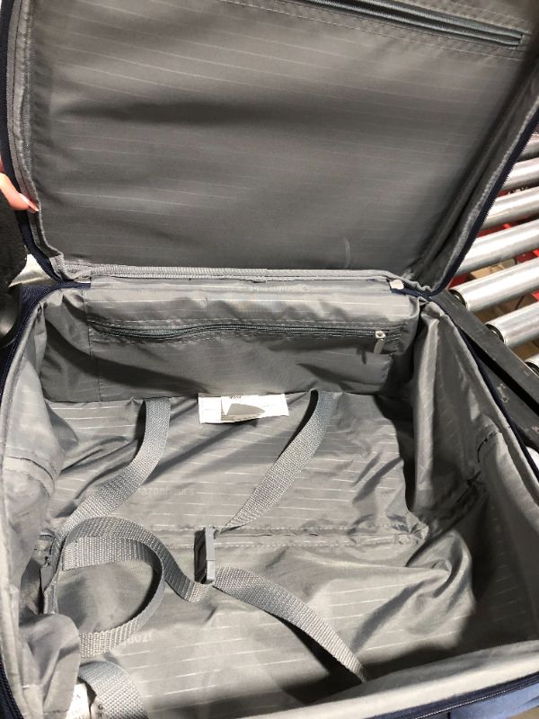 Photo 1 of Amazon Basics Softside Carry-On Spinner Luggage Suitcase - 21 Inch, Navy Blue
