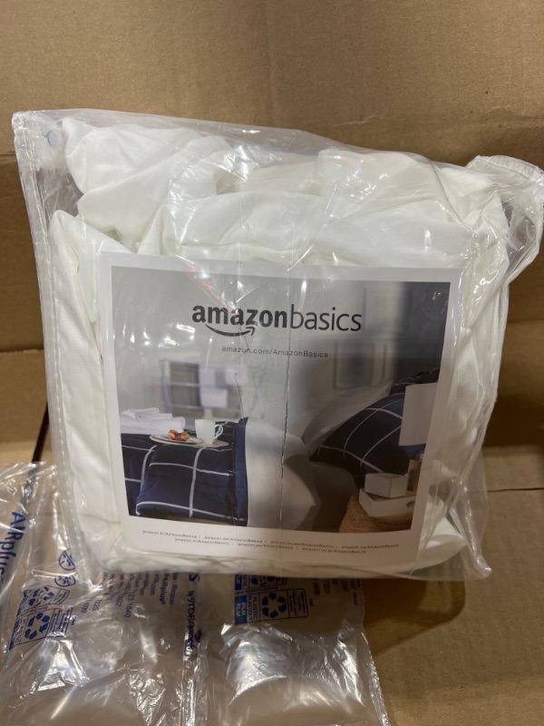 Photo 1 of Amazon Basics Zipper-Enclosed Waterproof Mattress and Box Spring Cover Protector - Twin Size, 9 to 12-Inch Depth

