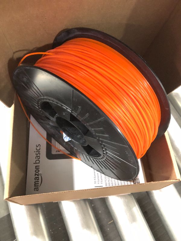 Photo 2 of AmazonBasics PLA 3D Printer Filament, 1.75mm, Neon Orange, 1 kg Spool
