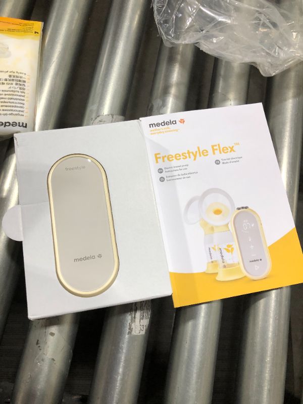 Photo 2 of Medela Freestyle Flex Breast Pump, Closed System Quiet Handheld Portable Double Electric Breastpump, Mobile Connected Smart Pump with Touch Screen LED Display and USB Rechargeable Battery