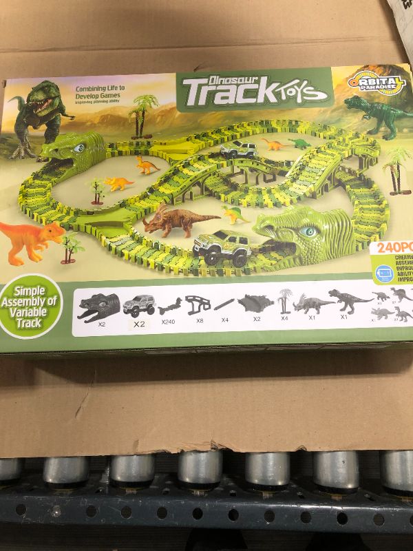 Photo 2 of Etto Dinosaur Toys with 240 Flexible Tracks, 2 Toy Cars, 10 Dinosaurs, 4 Ramps, Dinosaur Toys Race Track Playset for 3 4 5 6 7 8 9 Year Old Boys and Girls
