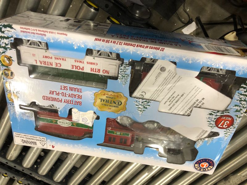 Photo 2 of Lionel North Pole Central Ready-to-Play Freight Set, Battery-powered Model Train Set with Remote Multi, 50 x 73"
