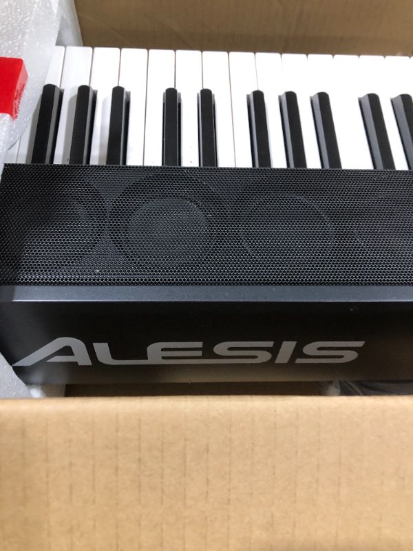 Photo 4 of Alesis Recital Grand - 88 Key Digital Piano with Full Size Graded Hammer Action Weighted Keys, Multi-Sampled Sounds, 50W Speakers, FX and 128