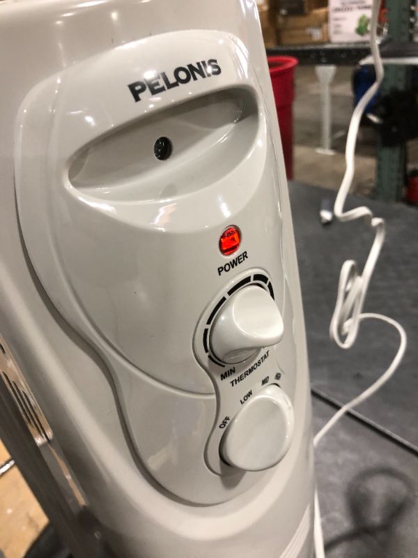 Photo 2 of PELONIS PHO15A2AGW, Basic Electric Oil Filled Radiator, 1500W Portable Full Room Radiant Space Heater with Adjustable Thermostat, White, 26.10 x 14.20 x 11.00
