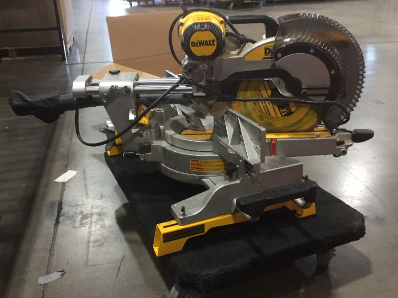 Photo 4 of DEWALT 12-Inch Sliding Compound Miter Saw, Double Bevel (DWS780) , Black
