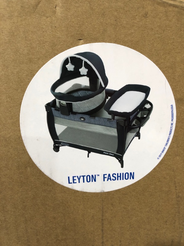 Photo 3 of Graco Pack 'n Play Travel Dome LX Playard | Includes Portable Bassinet, Full-Size Infant Bassinet, and Diaper Changer, Leyton. SEALED BOX. NEW ITEM.
