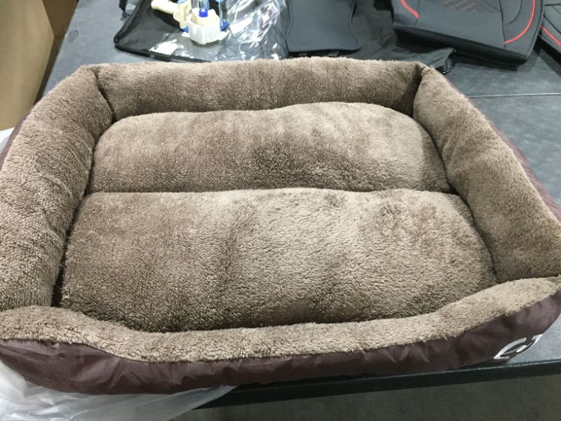 Photo 1 of 36" x 29" ped bed, light and dark brown 