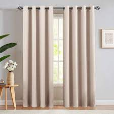 Photo 1 of 52" x 108" tan curtains with metal o rings, pack of three