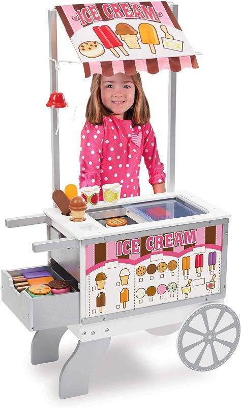 Photo 1 of Melissa & Doug Wooden Snacks and Sweets Food Cart - 40+ Play Food pcs, Reversible Awning