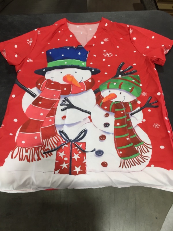 Photo 1 of Christmas themed scrub top (XL)