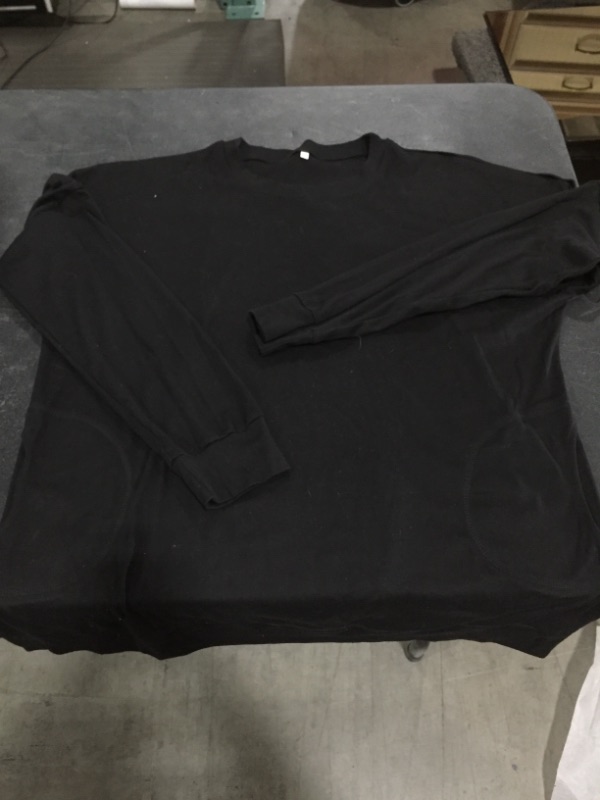 Photo 1 of Women's black longsleeve with pockets (XXL)