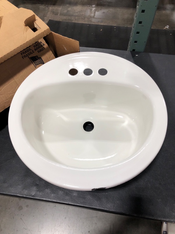 Photo 2 of Bootz Laurel Round Lavatory Sink White. DENTED AND CHIPPED EDGE. 
