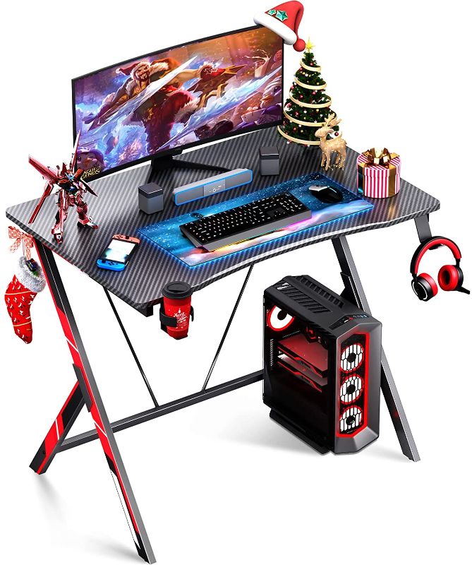 Photo 1 of Motpk Gaming Desk 31 inch, Small Gaming Desk for Kids, Gift Idea, PC Computer Desk, Home Office Desk Workstation with Carbon Fiber Surface, Gaming Table with Headphone Hook and Cup Holder
