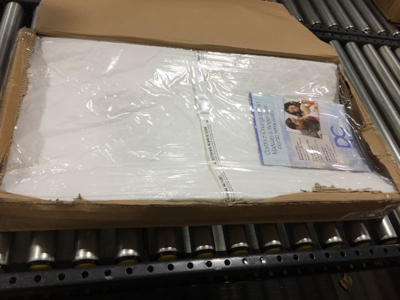 Photo 1 of Delta Children Contoured Changing Pad, White
