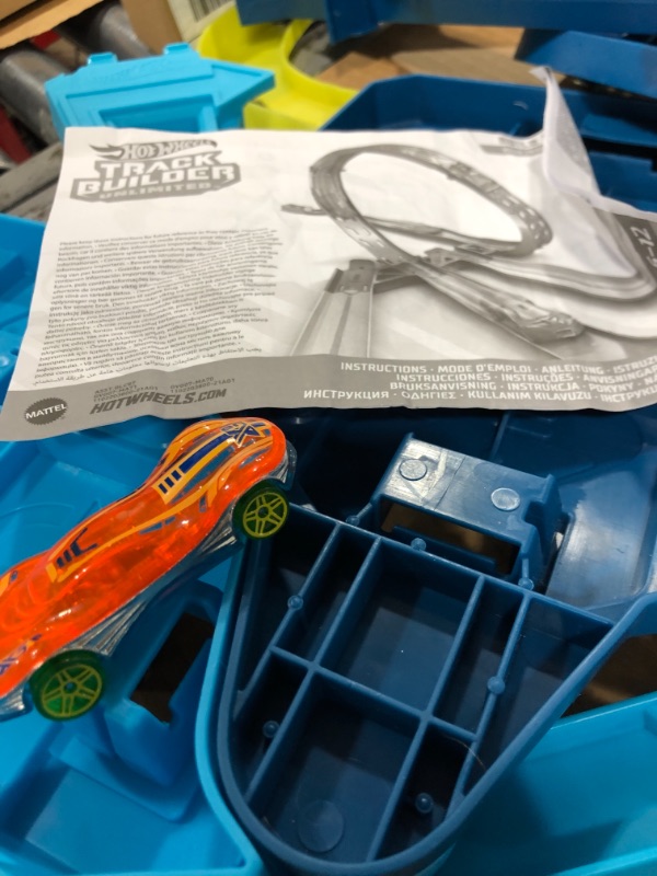 Photo 3 of Hot Wheels Track Builder Unlimited Infinity Loop Kit with Adjustable Set-Ups & Jump That Flips Cars into Catch Cup for Kids 6 to 12 Years Old with One 1:64 Scale Vehicle
